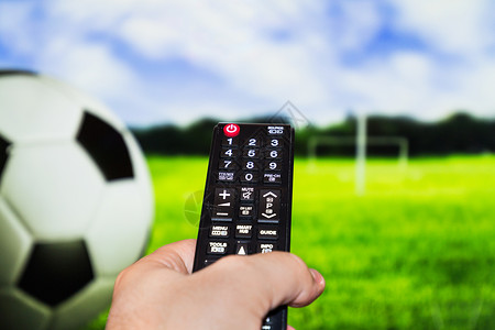 足球比赛和远程控制游戏闲暇运动手指控制乐趣居住按钮电影院家庭改变高清图片素材