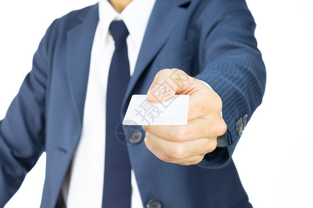 商务身份名牌直观的商务人士持有名牌或白卡是背景