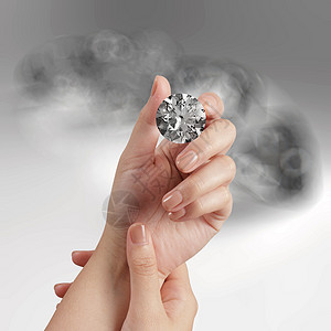 手持3D钻石在灰色背景上宝石百万富翁渲染订婚石头类别物品珠宝火花商业背景图片