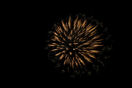 美丽的烟花派对火花黑色天空星星焰火橙子庆典背景图片