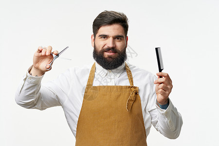 一名长胡子梳子的男子 剪剪剪剪刀理发店野蛮高清图片素材