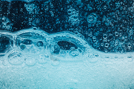 抽象液体肥皂泡泡蓝色背景冲洗空气凝胶粒子淋浴泡沫方法洗发水肥皂泡民众背景图片