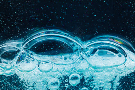 抽象液体肥皂泡泡蓝色背景空气凝胶冲洗泡沫洗涤洗澡漂浮墙纸粒子方法背景图片