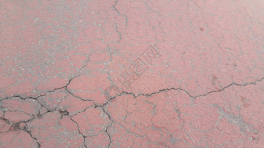 3d地裂素材红色损坏的道路或铺有裂缝的道路地面泥路划痕沉积建筑学材料石膏街道侵蚀路面背景