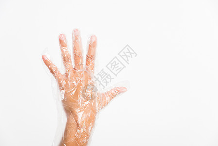 戴单用手的女子保护可一次性透明塑料板工具护士手指皮肤女士乳胶工人女性保健手臂背景图片