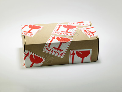 货物标签带有粘贴标签的包裹邮政工作室展示纸盒密封包装送货礼物对象商品背景