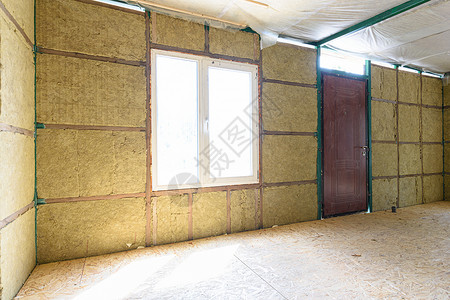 乡间别墅内墙的碎片 墙壁用矿物板隔热地面技术矿棉石头国家羊毛绝缘框架隔音小屋背景图片