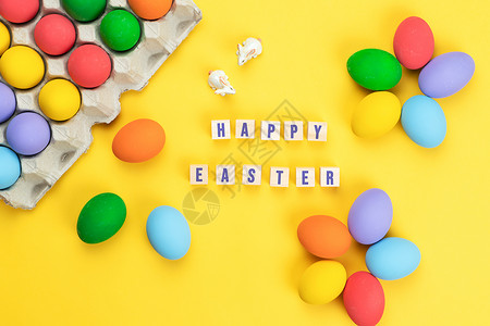 兔子面复活节日小兔子兔 小兔子在黄面包上装饰鸡蛋假期传统礼物朋友猎人季节家庭场地打猎蓝色背景