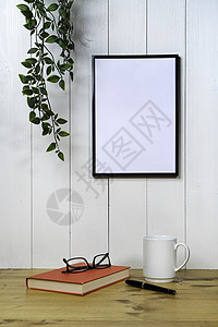 单身汪海报一个空白的黑框和一团圆体画廊文件夹身份床单展示办公室照片木板植物夹子背景