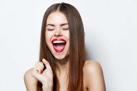 长发型好玩的女人 笑着口红情绪化的高清图片素材