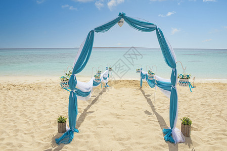 婚礼海滩热带海滩的婚礼过道安排结婚日海景假期海洋天堂荒岛花朵海岸地平线海岸线背景