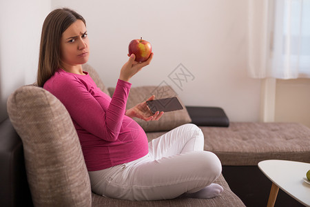 不要节食素材孕妇不想吃水果 不要吃水果诱惑巧克力女性欲望孩子母性女士糖果饮食护理背景