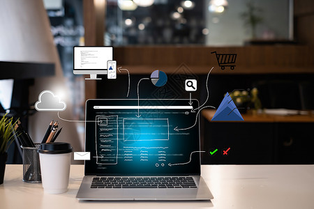 在现代办公室的桌子上用图标模拟笔记本电脑 Web 设计师 开发 ux ui 概念头脑风暴高清图片素材
