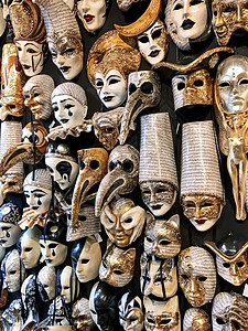 一家商店墙上的威尼斯狂欢节面具图表传统旅游男人店铺城市市场艺术文化纪念品背景图片