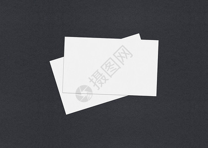 灰色纸质纸面背景的空白白色商业卡片模拟堆叠标识品牌办公室打印智能嘲笑小样名片样机文档背景图片