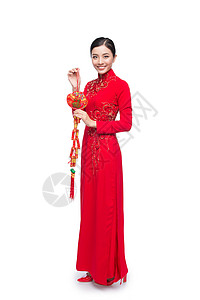 一位美丽的亚洲妇女穿着传统节服Ao Dai Tet节日 月亮新年 全文指幸运和幸福女孩女性旗袍白色裙子红色假期身体快乐背景图片