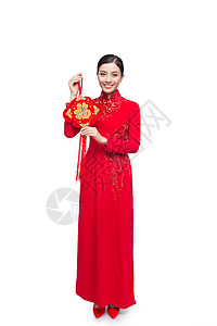 一位美丽的亚洲妇女穿着传统节服Ao Dai Tet节日 月亮新年 全文指幸运和幸福红色问候语旗袍商业信封微笑女孩假期身体背景图片