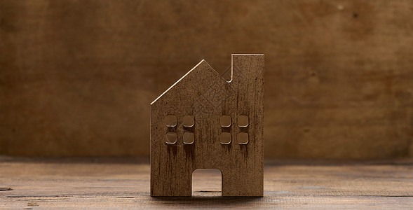 褐色背景的棕色木屋 不动产租赁 购买和销售概念 房地产服务 包括模型高清图片素材