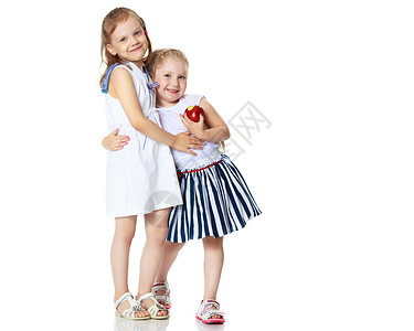 两个小女孩 苹果和两个小姑娘公园幸福姐姐女孩孩子喜悦闲暇公主夫妻友谊生活方式高清图片素材