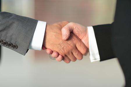 商业伙伴之间可信赖的握手方式商务人士工作就业客户顾客繁荣协议团体力量商人高清图片素材