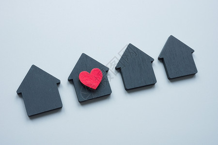 房屋选择概念 房屋图案和有心脏符号的住宅图案 是被选中的背景图片