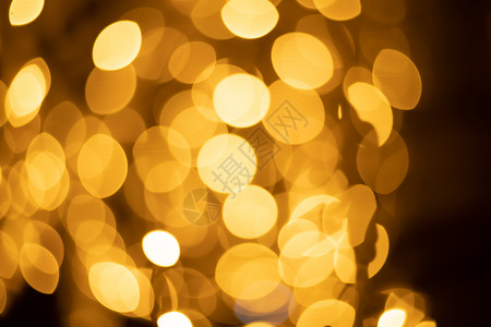 圣诞照亮在城市中闪耀的眼光速度情绪金光天空店铺奢华照明时尚气泡镜片背景图片