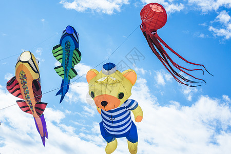 蝠鲼带神奇人物的飞行风筝背景