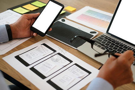 设计智能电话布局网络的UX设计师 UI 开发者计划使用移动应用原型 并进行相关规划设计者团队编程反应合作项目开发商用户工作战略随意的高清图片素材