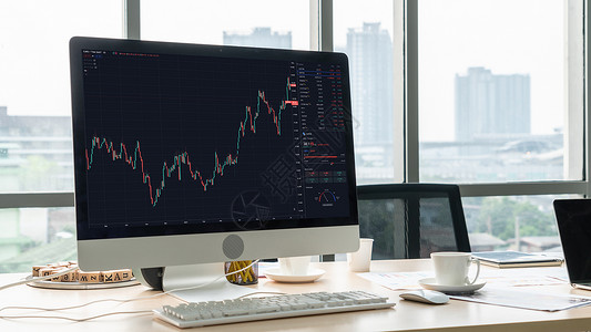 按巧妙计算机软件分析股票市场数据图表图笔记本报告金融技术成功投资生长电脑股市价格公司高清图片素材