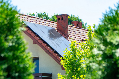 一代带有光伏发电模块的房顶屋顶环保电气活力技术农家房子绿色细胞植物力量背景