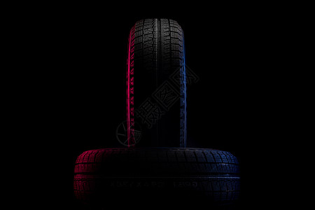 具有胎面的轮胎 用于在黑色背景上行驶 带有红蓝照明图像橡皮高清图片素材