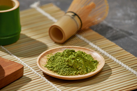 木制桌边的茶 复制空间杯子仪式叶子绿色地面美食药品白色草本文化图片