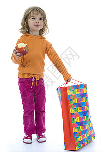美丽的小女孩 与多 红色的 圣诞节 礼物 苹果 人少 郎背景图片