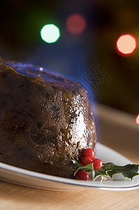 圣诞节用白兰地火烈焰 圣诞大餐 朗姆酒 葡萄干 火焰 杏仁背景图片
