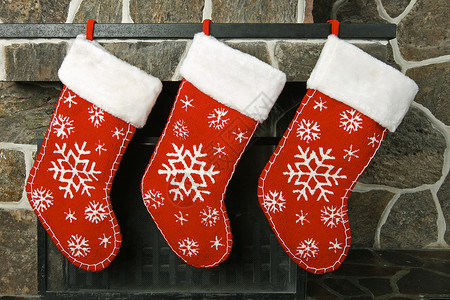 圣诞短袜 圣诞早晨 礼物 圣诞节前夕 放养填料 假期 圣诞礼物 壁炉架 壁炉背景图片