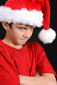 圣诞男孩 可爱的 眼睛 孩子 帽子 假期 季节性的 红色的背景图片