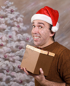 圣诞快乐 男性 毛衣 幸福 盒子 假期 树 礼物背景图片