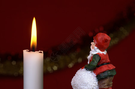 圣诞老人和蜡烛背景图片