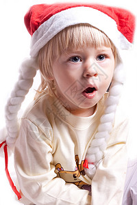 穿着带胸罩的圣诞帽子的小姑娘 喜悦 有趣的 金发背景图片
