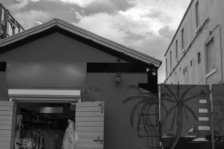 加勒比建筑协会 村庄 云 海洋 假期 墙 店铺背景图片