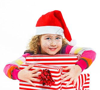 带着礼物盒的圣诞老人帽子小女孩 尖叫 装饰品 乐趣图片