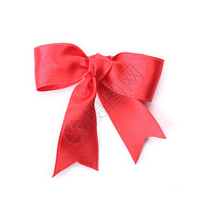 白色背景上的红弓 华丽的 礼物 装饰品 爱 圣诞节 闪亮的背景图片