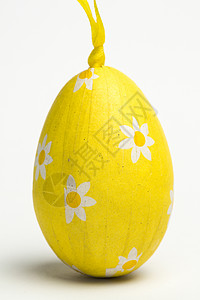 黄包装的复活节彩蛋背景图片