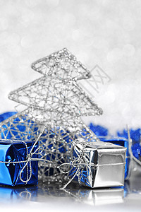 圣诞卡 蓝色的 闪耀 冷杉 树 盒子 闪光 弓 假期 丝带背景图片
