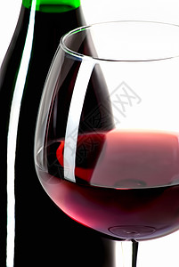 酒瓶和装满白葡萄酒的杯子 酒精 庆典 产品 红酒杯图片