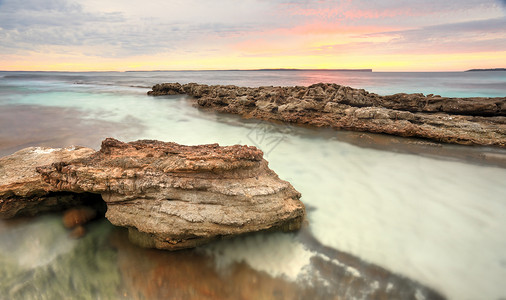 海姆斯海滩澳洲Hyams海滩日出时的柔软面粉颜色背景