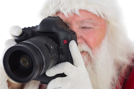 圣诞老人正在拍照 庆祝 化装舞会服装 数码相机 圣诞节 红色的 照片背景图片