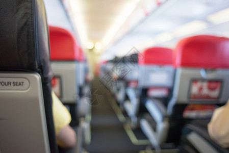 客机内分心移位 高架 商业 行李 蓝色的 空的 飞机场舱高清图片素材