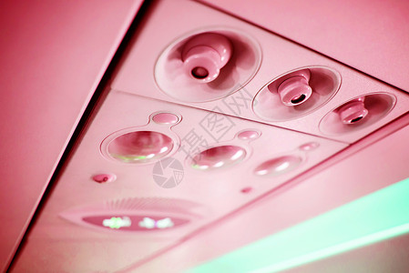 客机内分心移位 旅游 假期 高架 商业 飞机舱高清图片素材