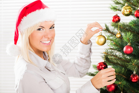 装饰圣诞树 圣诞装饰 圣诞饰品 女士 圣诞帽背景图片